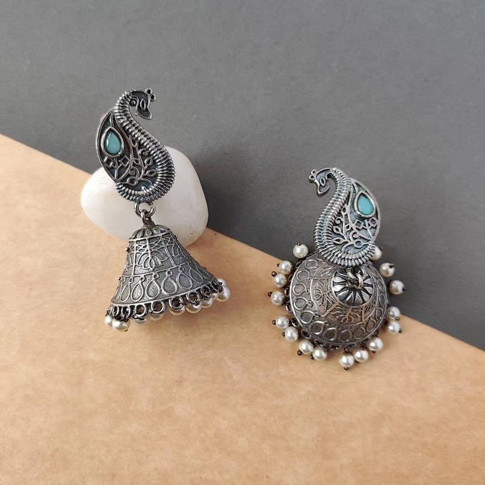 Triangle Jhumka Earrings Paired with Peacock Studs