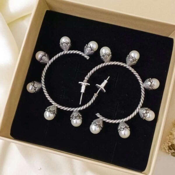 Most trendy pearl hoop earrings in oxidised silver finish for ethnic wear - attention-grabbing statement earrings