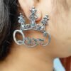 Queen stud earrings